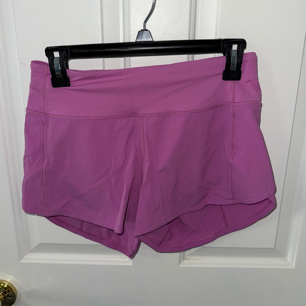 Lululemon Pink Shorts (Size 4 Tall) - built in liner and back pocket